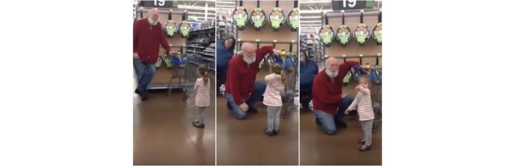 Homem chegou a abaixar para conversar com a garotinha. Foto: Reprodução/YouTube