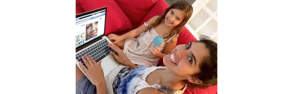 Bela Gil posta foto da filha sentindo o irmão mexer em sua barriga