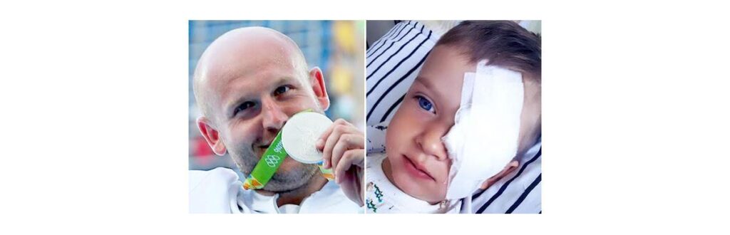 Piotr Malachowski e o menino Olek Szymanski