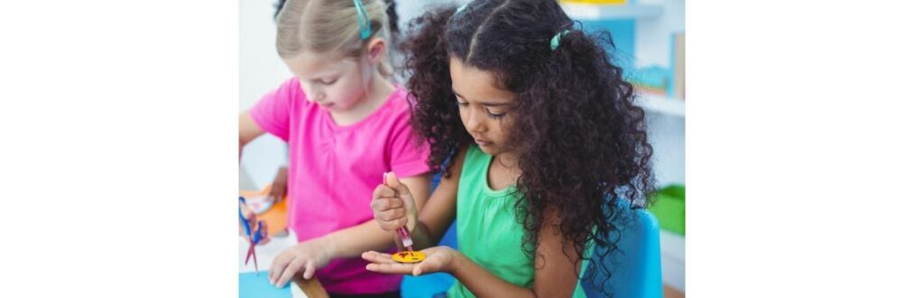 girls-making-arts-and-crafts-together-picture-id664075322