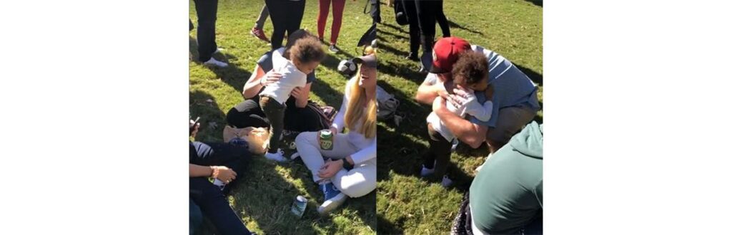 Menina amorosa se despede de todos no parque