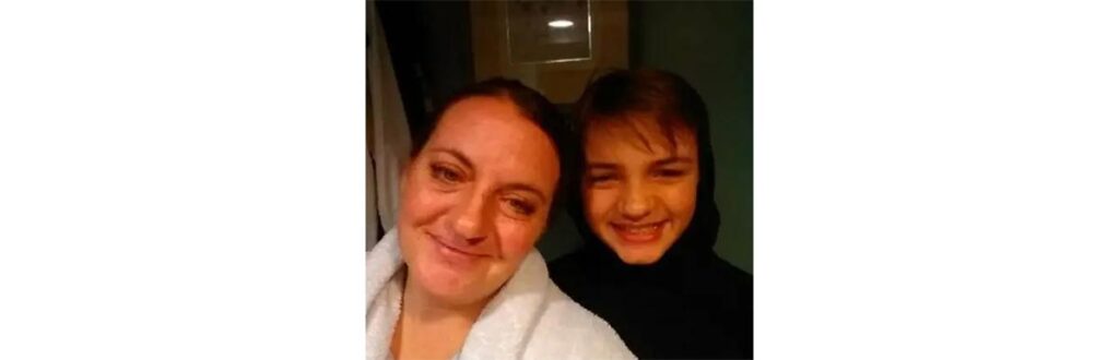 Filho sendo escoltado –