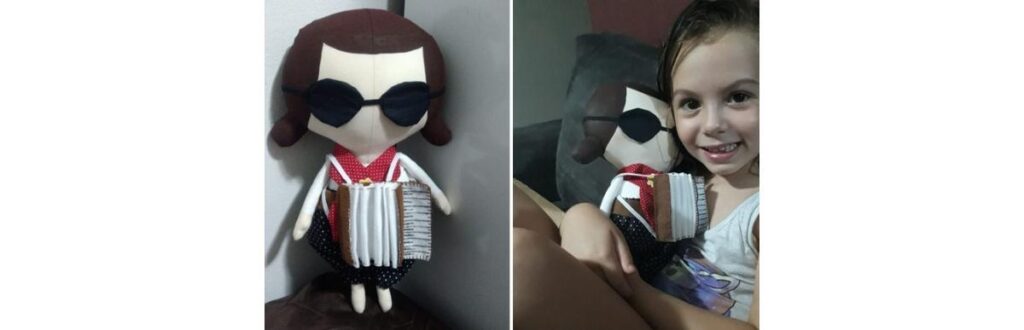 Lívia de 5 anos, ganha boneca deficiente visual