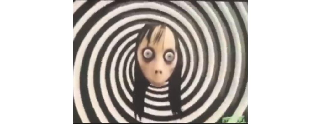 Momo volta a aparecer em vídeos pelas redes sociais. Saiba como conversar com seu filho sobre o assunto