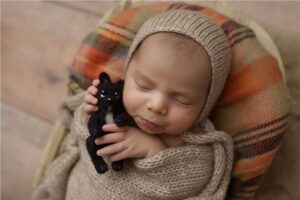 O casal fez um ensaio new born com o filho Zion