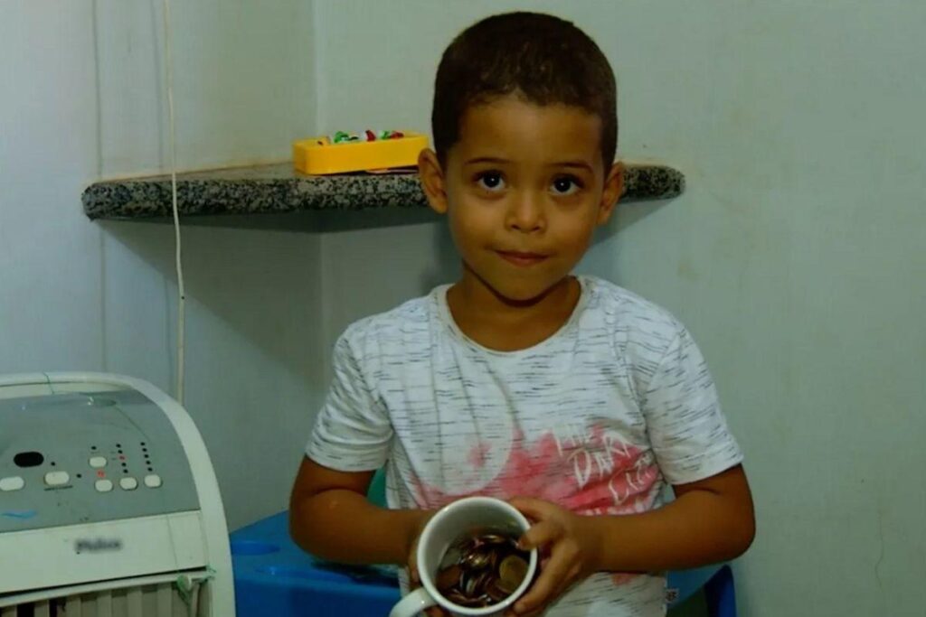 Faísca é um pinscher da cor preta e branca