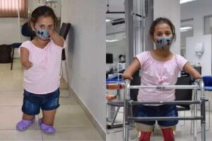 Raísa andando com as novas próteses