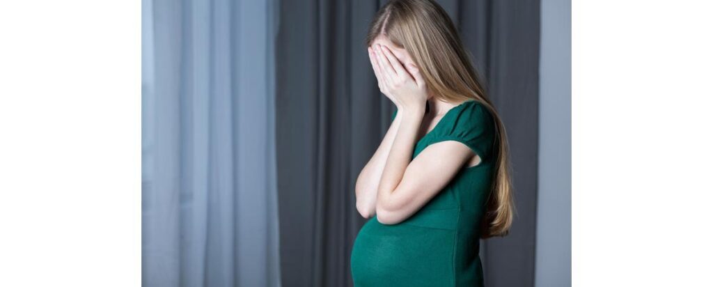 Amy com o filho Rocco de 2 meses