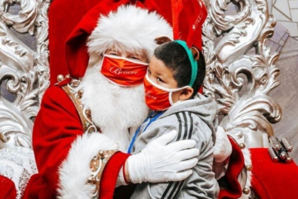 Criança com leucemia passa um dia com o Papai Noel