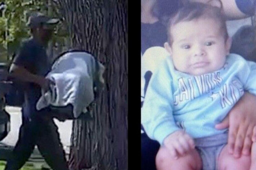 Momento em que o homem sai andando pela rua com o bebê