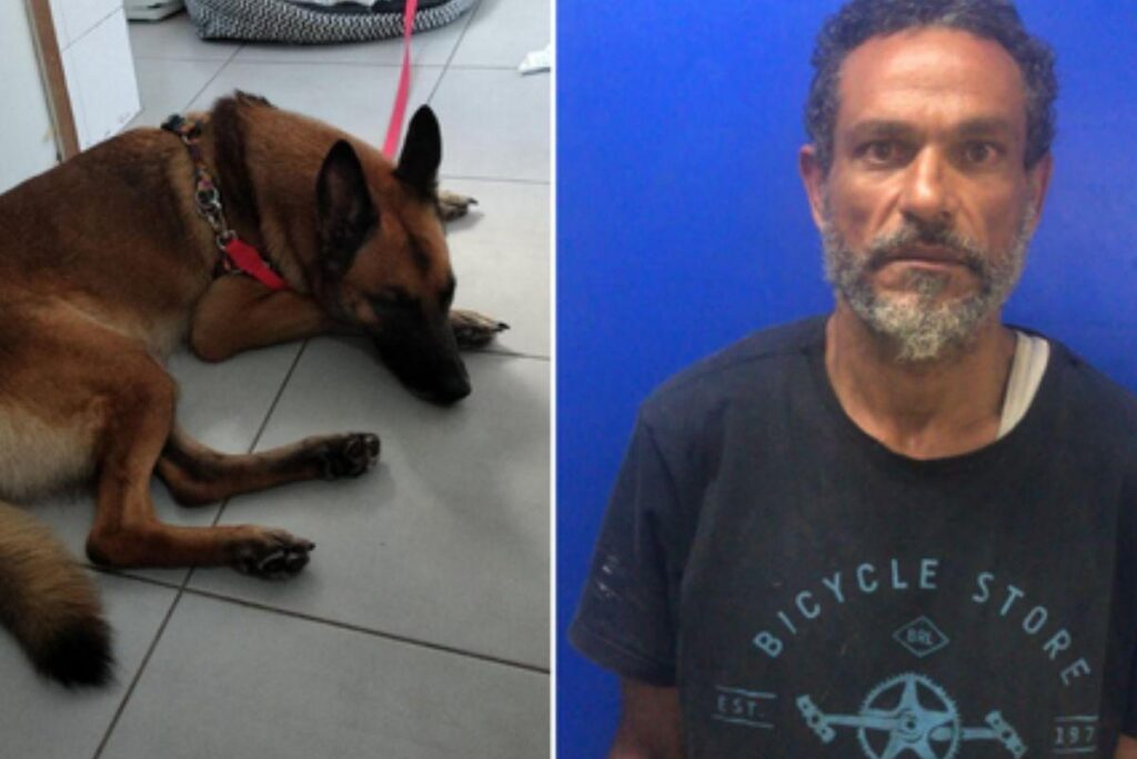 A inspetora ao lado do cão