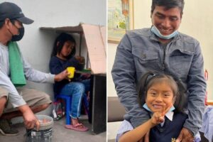 A menina estava estudando com uma mesa de papelão improvisada pelo pai