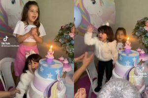 Menina viraliza ao aparecer brincando com sapos (Foto:Reprodução/G1)