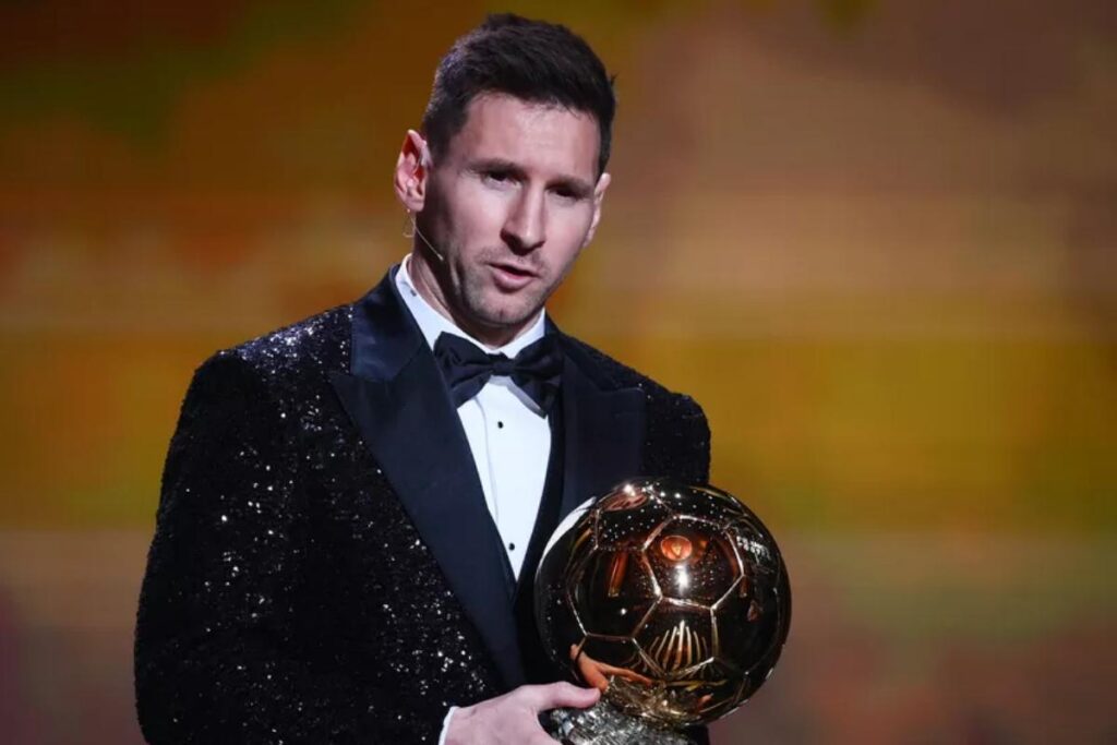 Messi ao lado da esposa e filhos