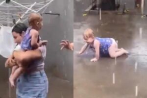 Pais deixam bebê brincar na chuva e dividem opiniões