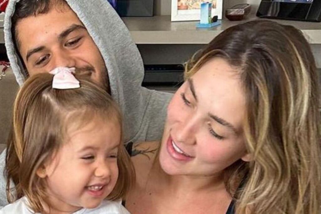 Virginia ao lado da família