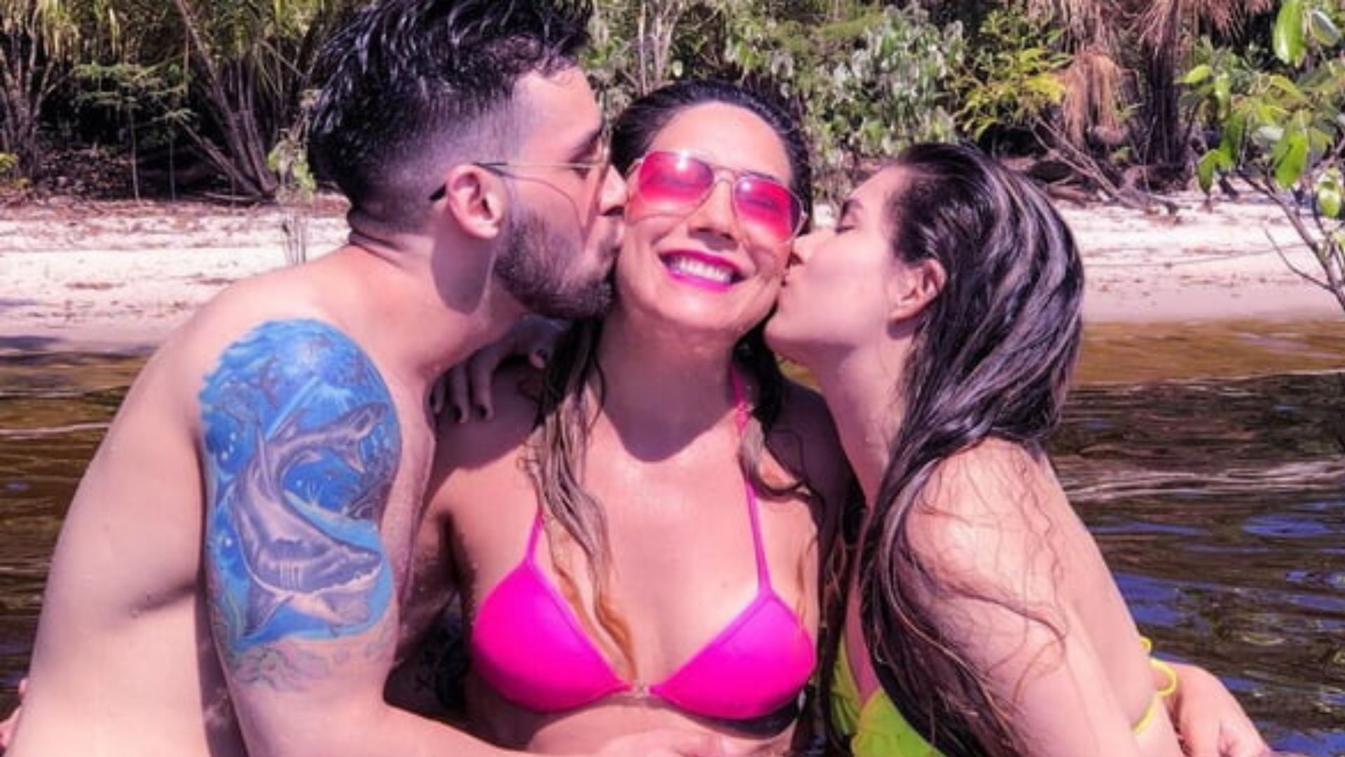 Fam&iacute;lia em um lago