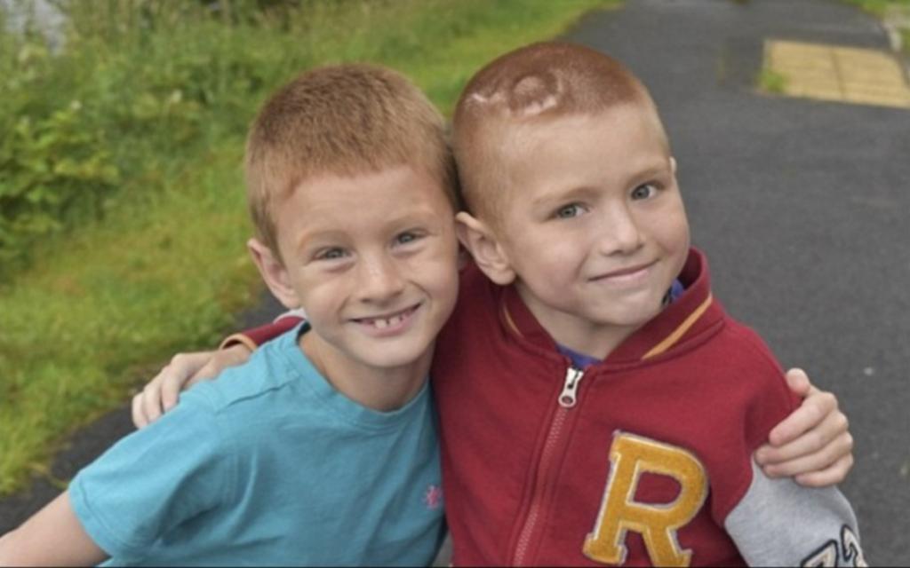 George McIntosh com o irmão Archie