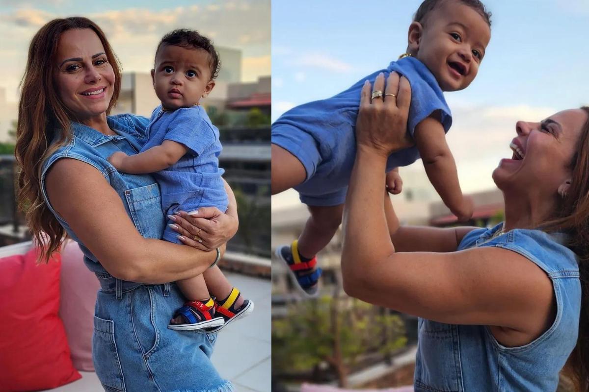 Viviane Araujo usando roupa jeans, assim com o filho, que está em seu colo