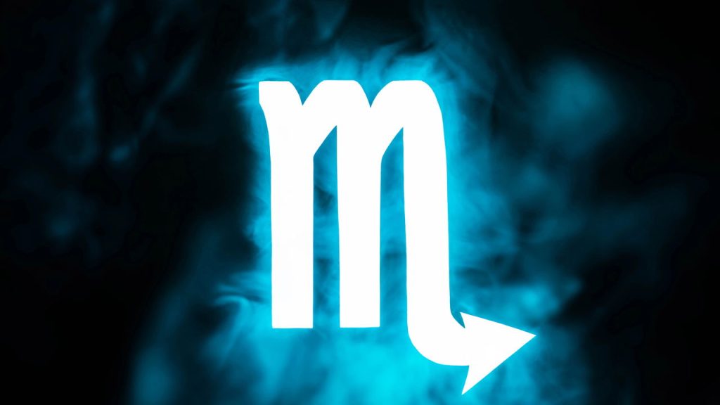 blue illuminated Scorpio zodiac sign with smoke on background