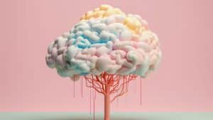Árvore em formato de cérebro em fundo rosa representando a formação de memórias dos bebês.