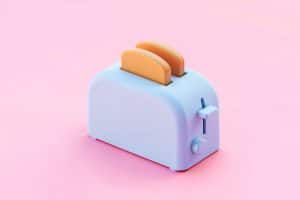Torradeira azul arredondada com dois pães em um fundo rosa.