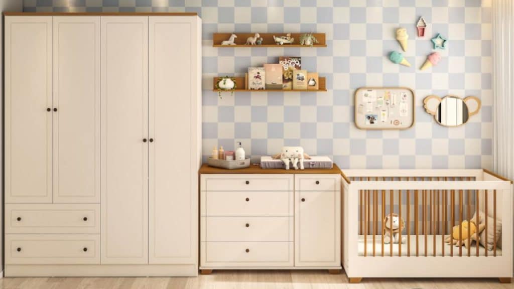 Quarto de bebê com armário, trocador e berço.