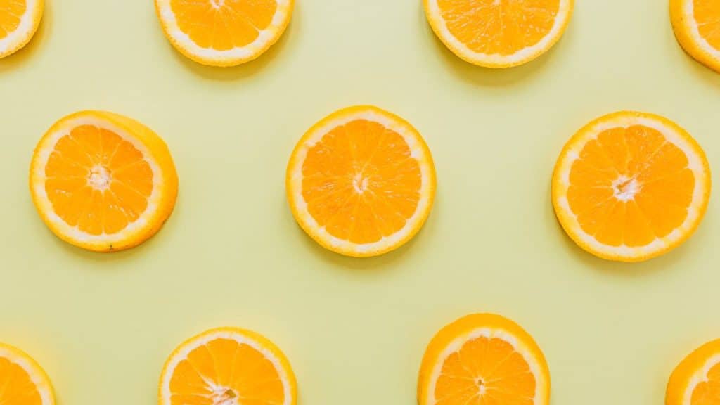 Fatias de laranja representando a estomatite.